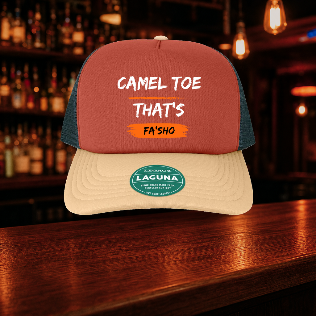 Camel Toe That's Fa'sho Trucker Hat shown against a warm after-dark bar backdrop
