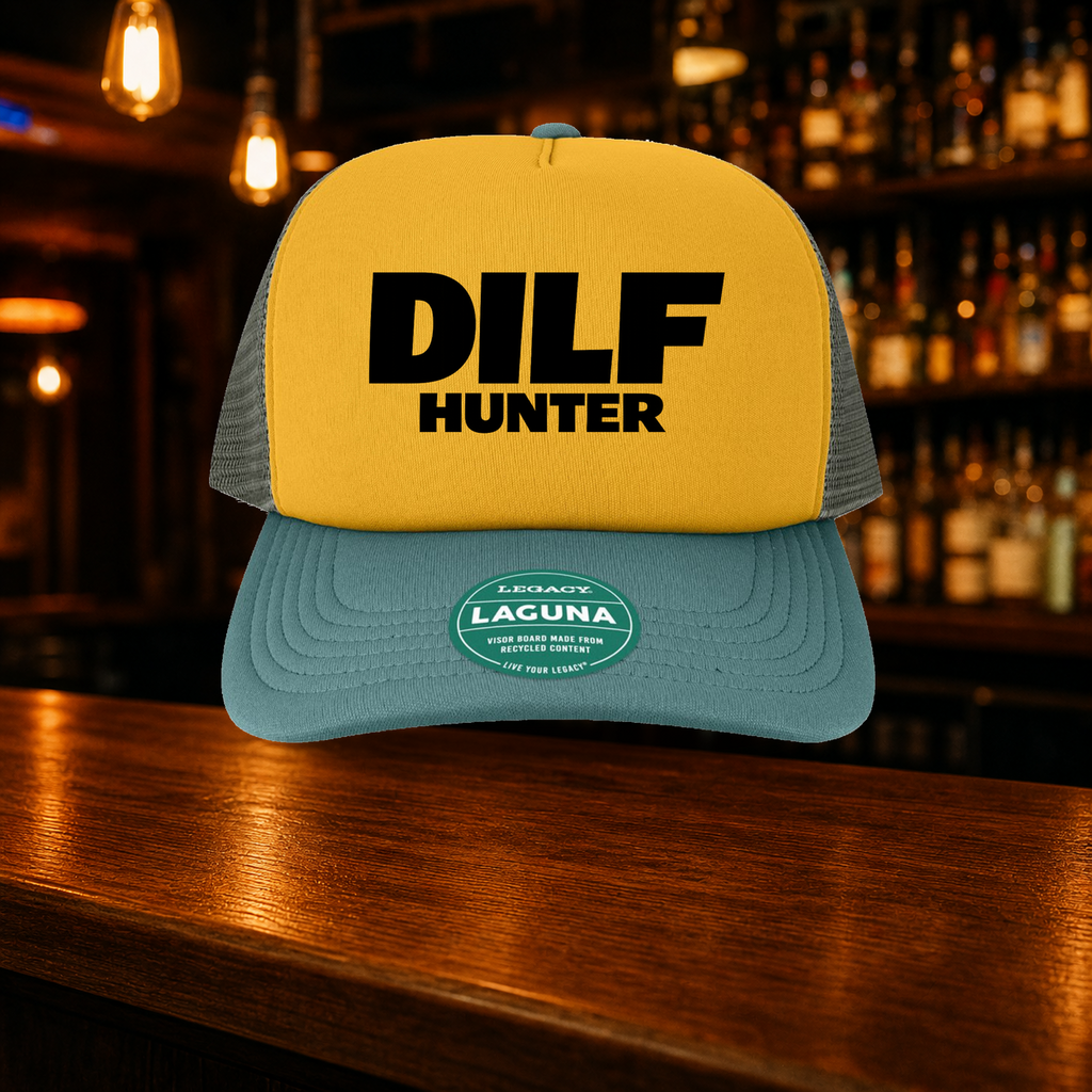 Dilf Hunter Trucker Hat — Bronze variety shown against a warm after-dark bar backdrop