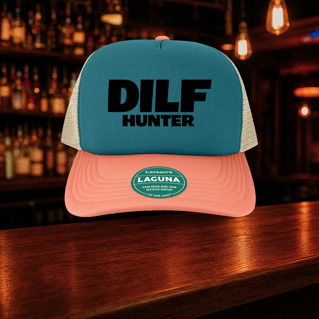 Dilf Hunter Trucker Hat — Marine variety shown against a warm after-dark bar backdrop