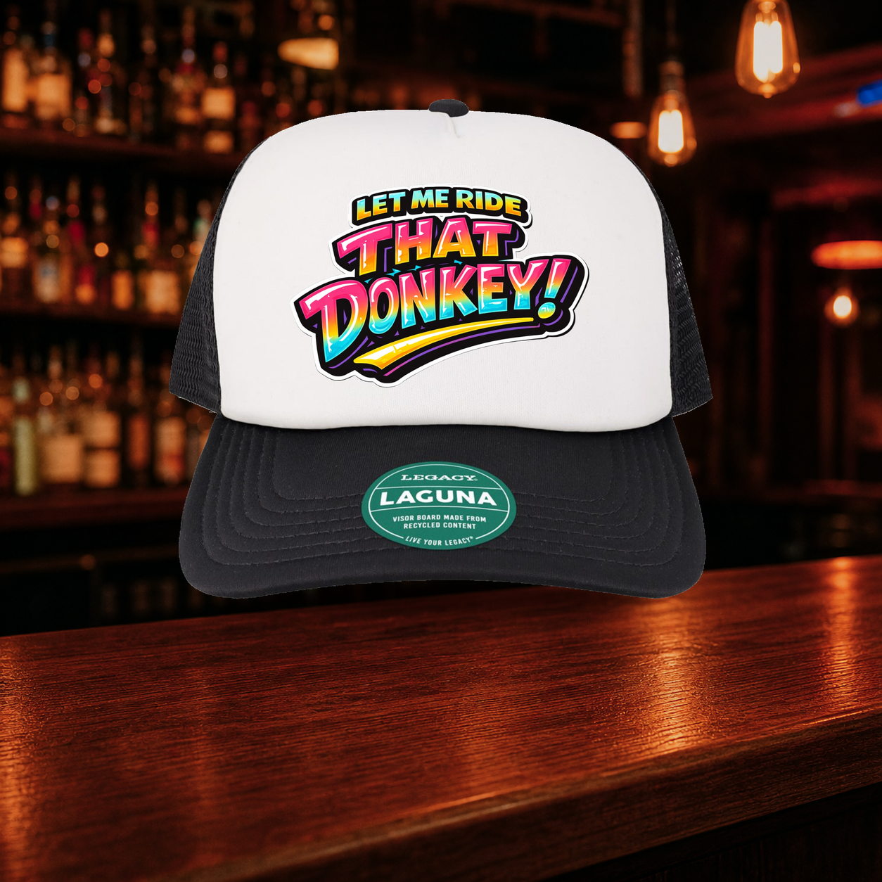 Donkey Trucker Hat shown against a warm after-dark bar backdrop