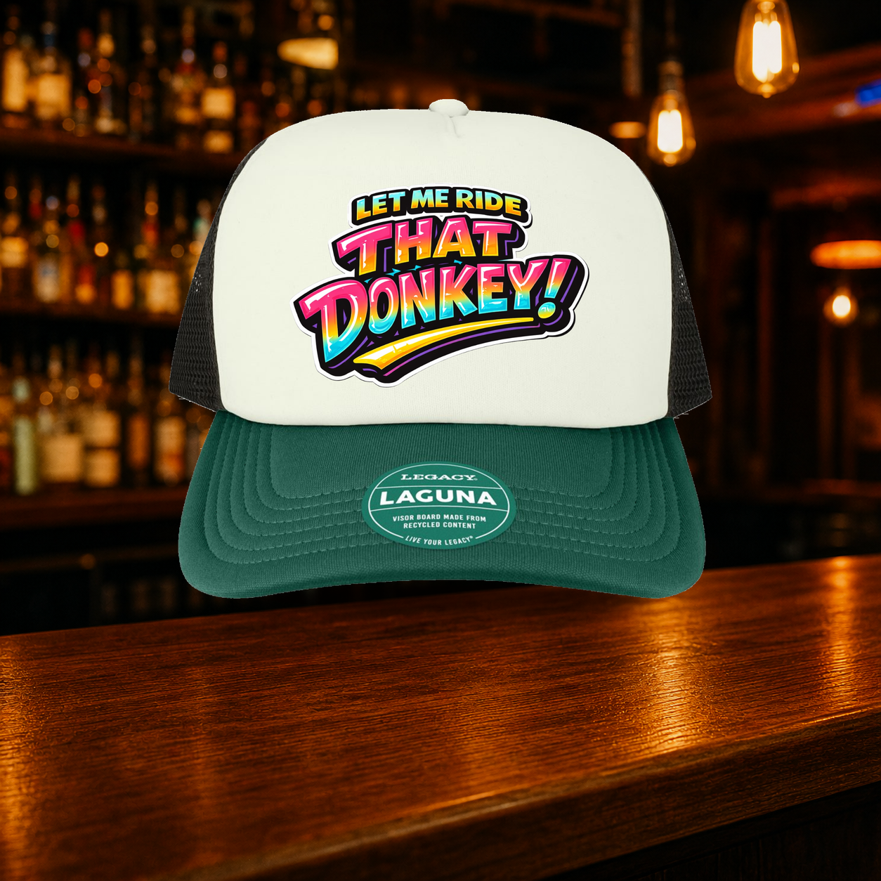 Donkey Trucker Hat — Green variety shown against a warm after-dark bar backdrop