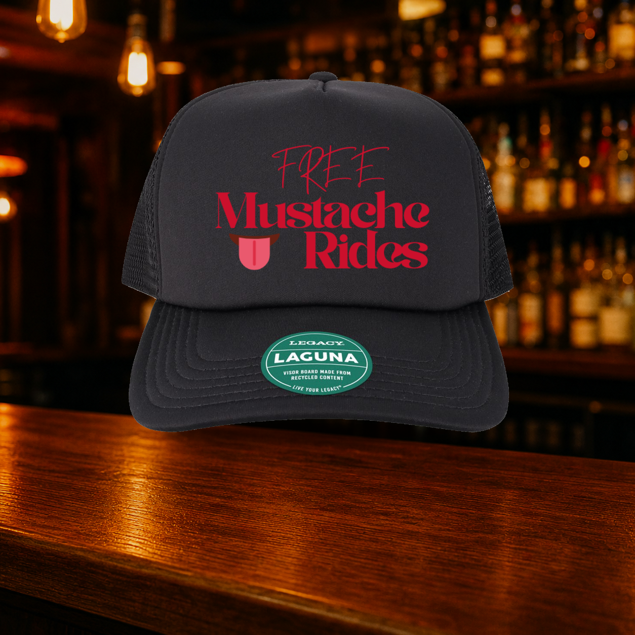Free Mustache Rides Trucker Hats shown against a warm after-dark bar backdrop