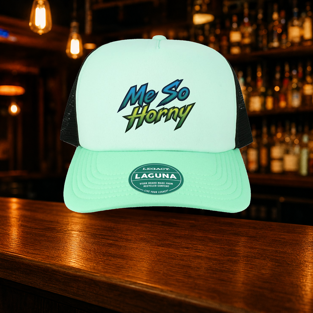 Me So Horny Trucker Hat — Teal variety shown against a warm after-dark bar backdrop