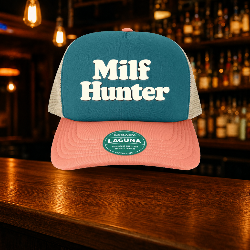 Milf Hunter Trucker Hat — Marine variety shown against a warm after-dark bar backdrop