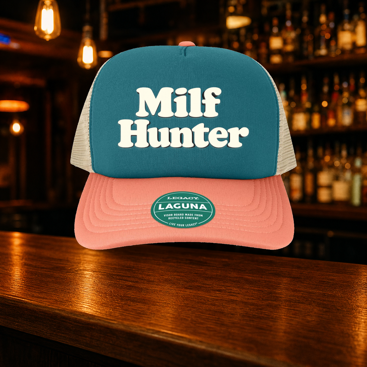 Milf Hunter Trucker Hat — Marine variety shown against a warm after-dark bar backdrop