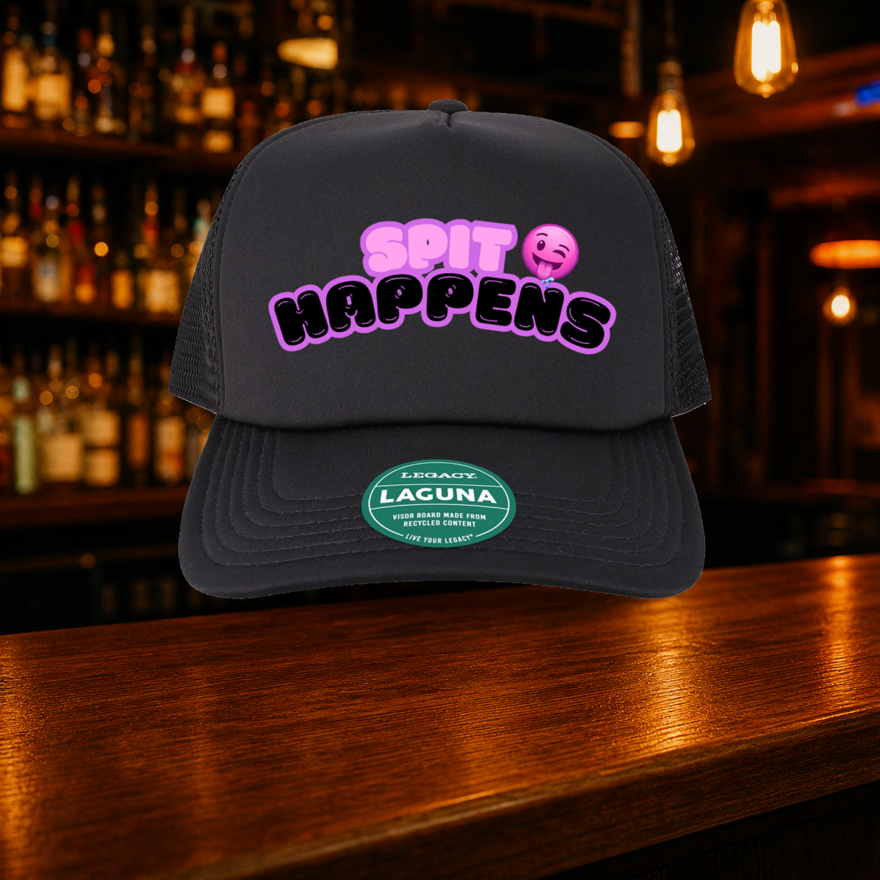 Spit Happens Trucker Hat — All Black variety shown against a warm after-dark bar backdrop